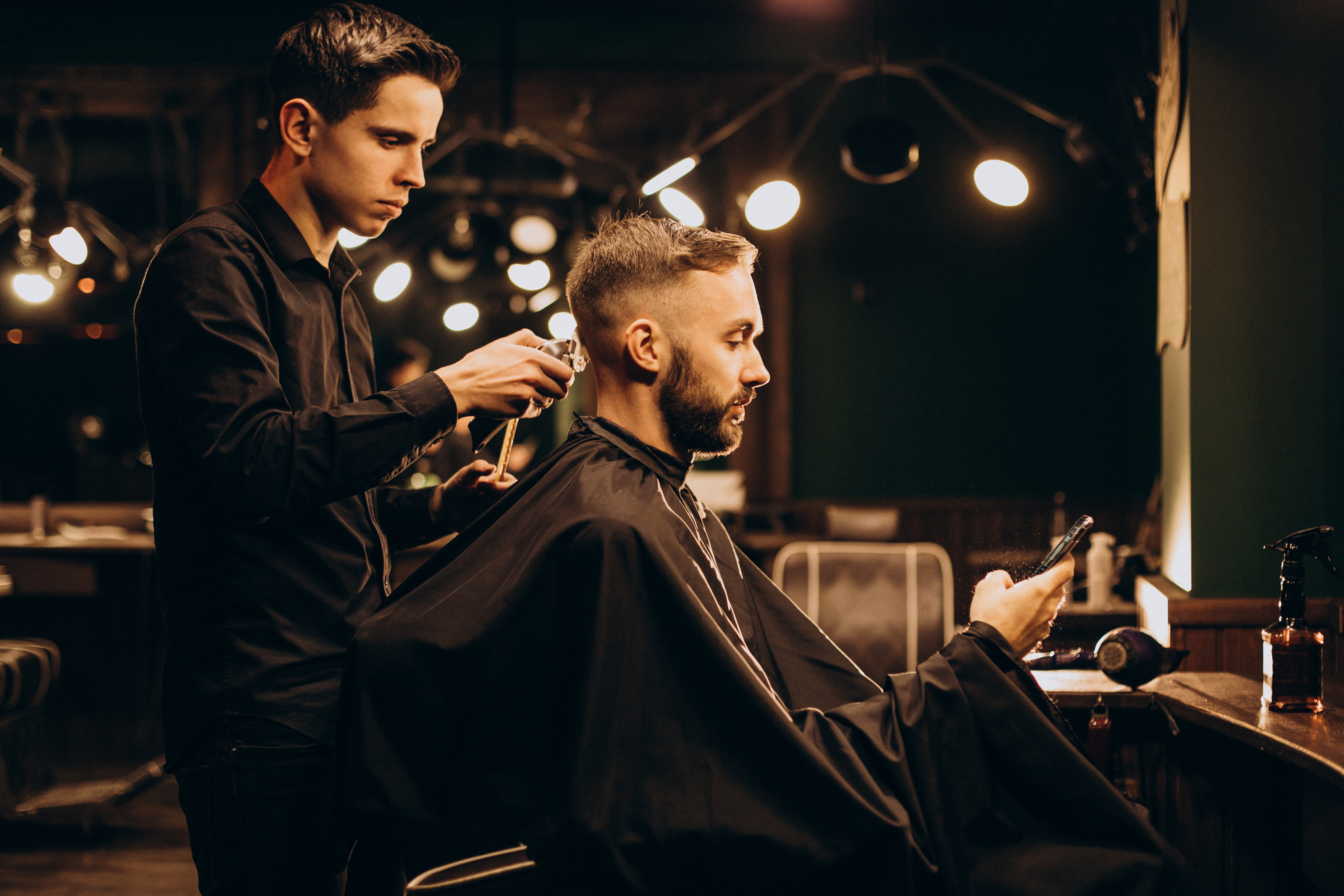 Barber cutting hair